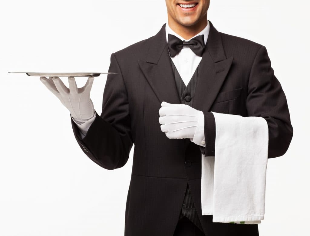 Butler Holding Empty Tray And Napkin - Isolated